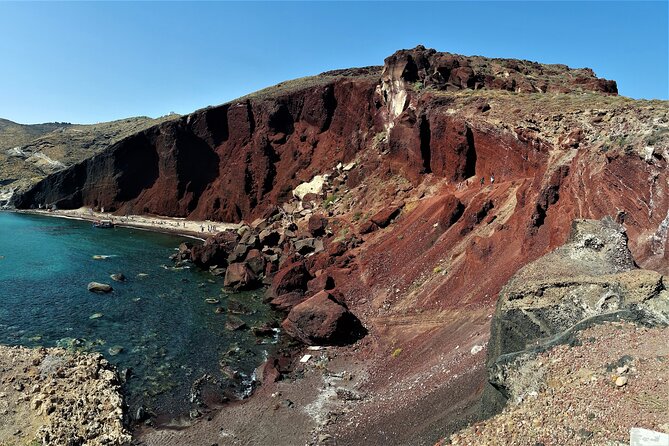 Sailsational Luxury Santorini Catamaran Sunset Cruise with Dinner - White Beach and the pale volcanic cliffs