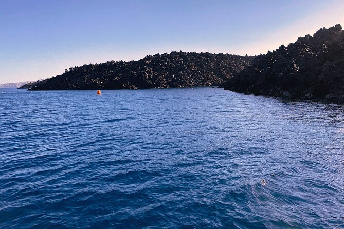 Sailsational Luxury Santorini Catamaran Sunset Cruise with Dinner - Mesa Pigadia, swimming, and dinner at sea