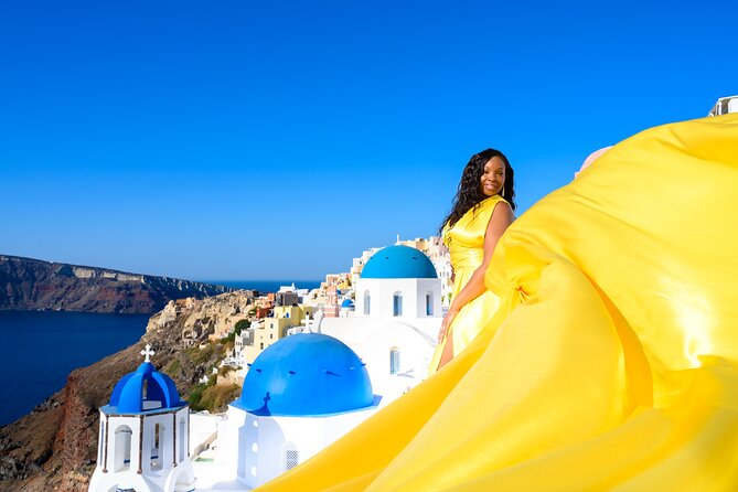 Santorini 2h Private Flying Dress Photoshoot with Transportation - Starting with pickup and the dress fitting
