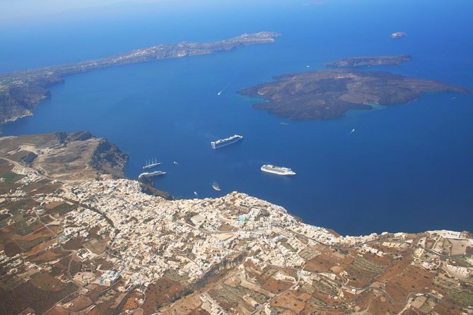 Santorini 30min Helicopter Tour - Pickup, transfer, and the 12:00 start