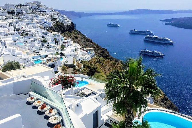 Santorini 5 Hours Sightseeing Tour - Perivolos Beach: black sand and a change of pace