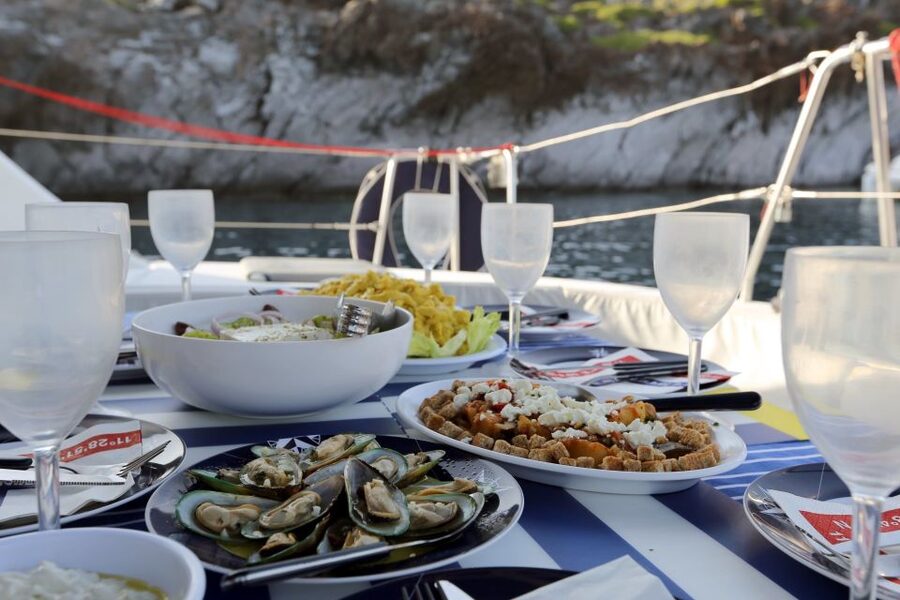Santorini: 7-Hour Private Catamaran Cruise with Food & Drink - Mesa Pigadia and the sunset finish