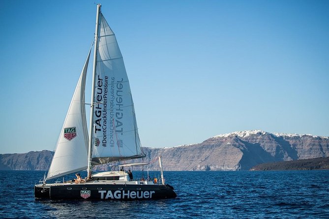Santorini: Adventurous Catamaran Experience with Snorkeling - Swimming near Black Mountain and Akrotiri Lighthouse