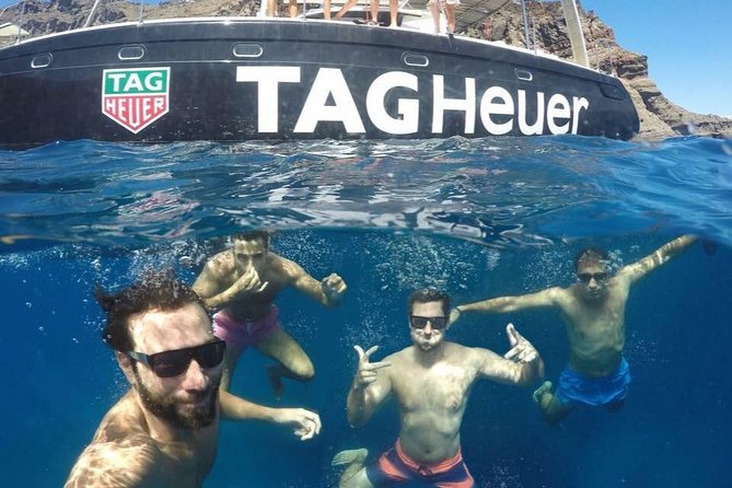 Santorini: Adventurous Catamaran Experience with Snorkeling - Red Beach and White Beach by boat