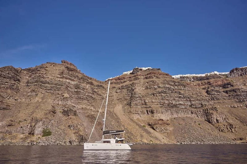 Santorini: Caldera Classic Catamaran Cruise w/ Meal & Drinks - Sunset sailing or a quieter morning return