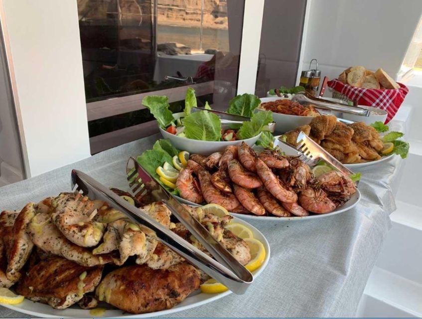 Santorini: Caldera Cruise with Greek Meal and Transfer - Seeing Santorini from the water