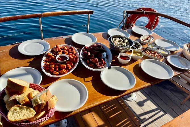 Santorini Caldera Day Traditional Cruise with Meal and Drinks - Red Beach and the southern coast