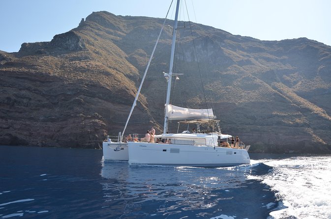 Santorini Caldera Gold Day Cruise with BBQ on board and Open Bar - Why Santorini looks better from a catamaran