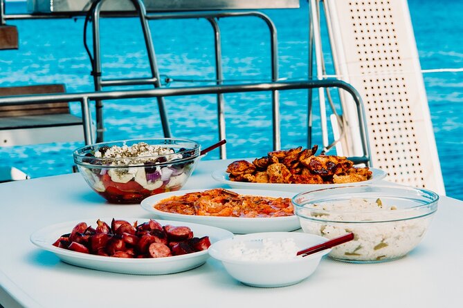 Santorini Caldera Gold Day Cruise with BBQ on board and Open Bar - Around the volcano and into the hot springs