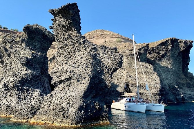 Santorini Caldera Gold Day Cruise with BBQ on board and Open Bar - Vlychada to Red Beach, the first taste of the coast