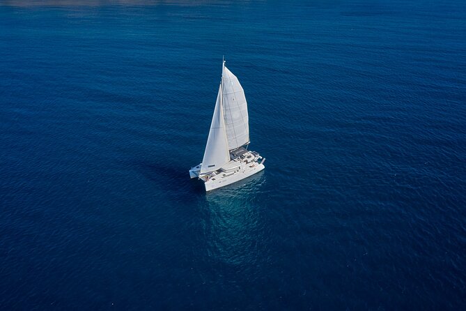 Santorini: Caldera Private Catamaran Cruise with Meal & Drinks - Volcanic rock and sulfur springs near the caldera