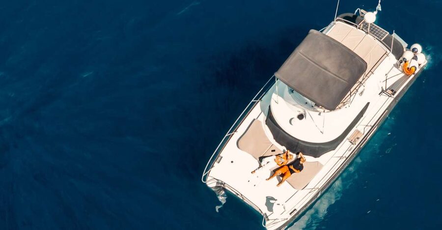 Santorini: Caldera Private Power Catamaran Cruise - Swimming beside the volcano and hot springs