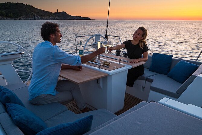 Santorini: Caldera Private Sailing Boat Cruise with Beneteau Oceanis 46.1 - Akrotiri Lighthouse and the southern volcanic coast