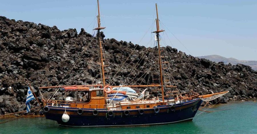 Santorini Caldera: Sunset Cruise with Dinner - Under Oia and on to the sunset