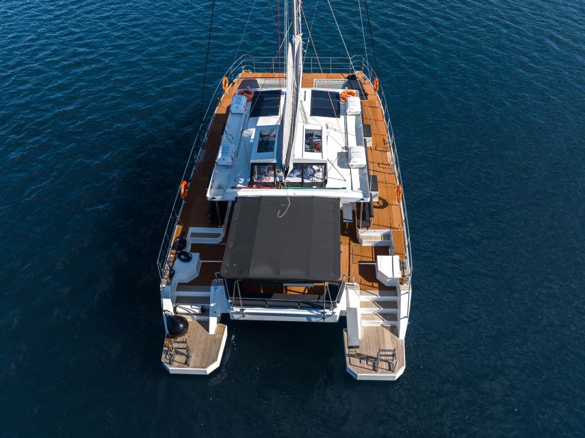 Santorini: Catamaran Caldera Cruise with Meal and Drinks - Red Beach, White Beach, and the volcanic colors