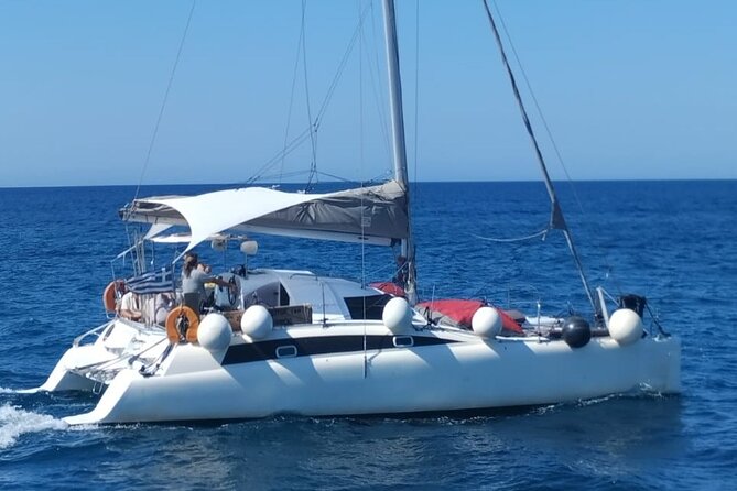 Santorini Catamaran Cruise – 5-Hour Private Sailing Experience - The lighthouse from the sea