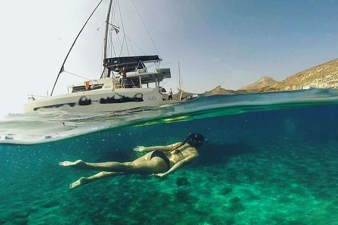 Santorini Catamaran Cruise with Fresh Meal and Open Bar - The onboard meal is a real part of the experience