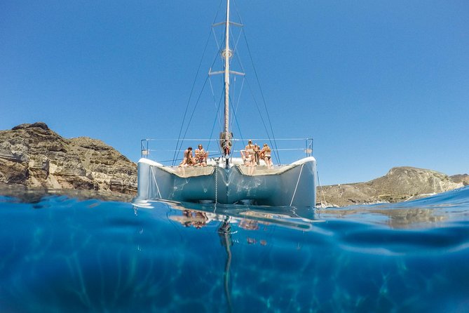 Santorini Catamaran Cruise with Fresh Meal and Open Bar - A relaxed start from Vlychada Port