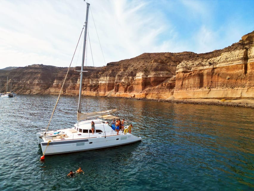 Santorini: Catamaran Cruise with Greek BBQ and Drinks - Key points at a glance