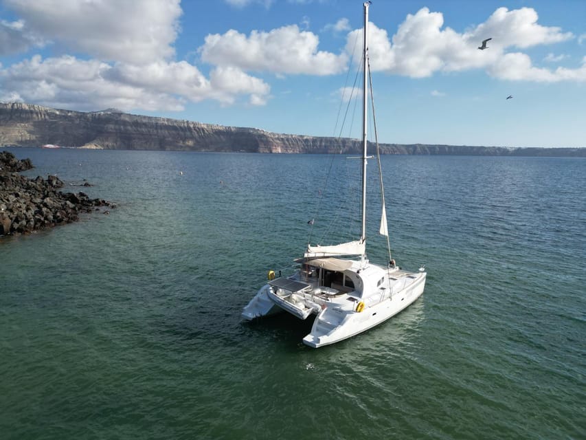 Santorini: Catamaran Cruise with Greek BBQ and Drinks - Why seeing Santorini by catamaran makes sense