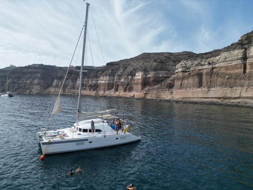 Santorini: Catamaran Cruise with Greek BBQ and Drinks - Transfers, timing, and practical planning