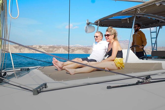 Santorini Catamaran Cruise with Greek Meal, Open-Bar and Sunset - Lunch on board: more than a snack between swims