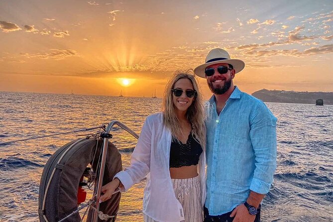 Santorini Catamaran Cruise with Greek Meal, Open-Bar and Sunset - The sunset sailing: Santorini’s best closing scene