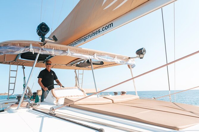 Santorini Catamaran Cruise: with Lunch, BBQ, Open Bar, Transfers - What the $133.08 price includes