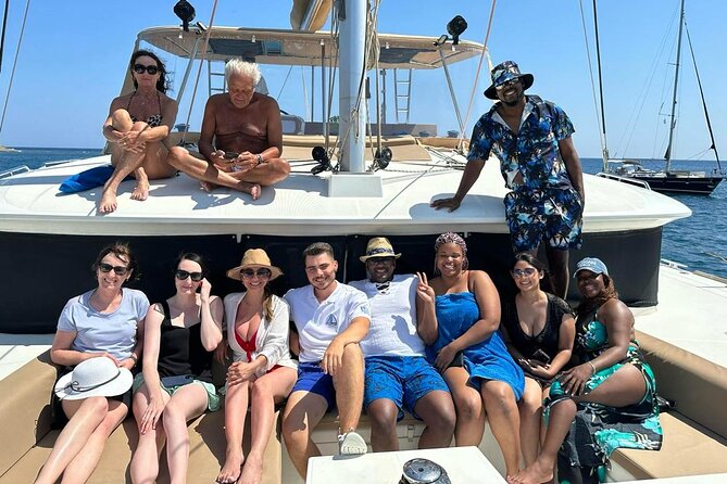 Santorini Catamaran Cruise: with Lunch, BBQ, Open Bar, Transfers - Red Beach, where Santorini shows its volcanic side