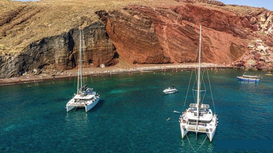 Santorini: Catamaran Cruise with Lunch, Drinks, & Oia Visit - Swimming at the volcanic hot springs
