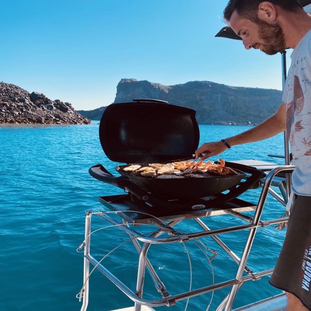 Santorini: Catamaran Cruise with Lunch, Drinks, & Oia Visit - Volcano, caldera cliffs, and Indian Rocks
