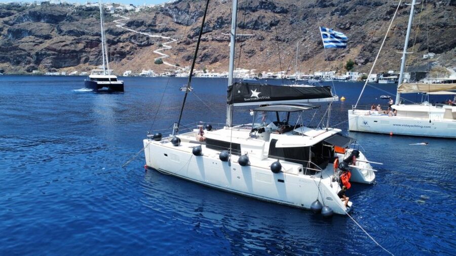 Santorini: Catamaran Cruise with Lunch, Drinks, & Oia Visit - Akrotiri Lighthouse and the two famous beaches