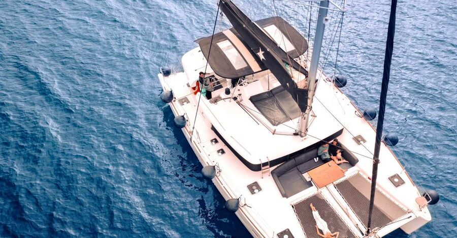 Santorini: Catamaran Cruise with Lunch, Drinks, & Oia Visit - Pickup from Thera or Oia