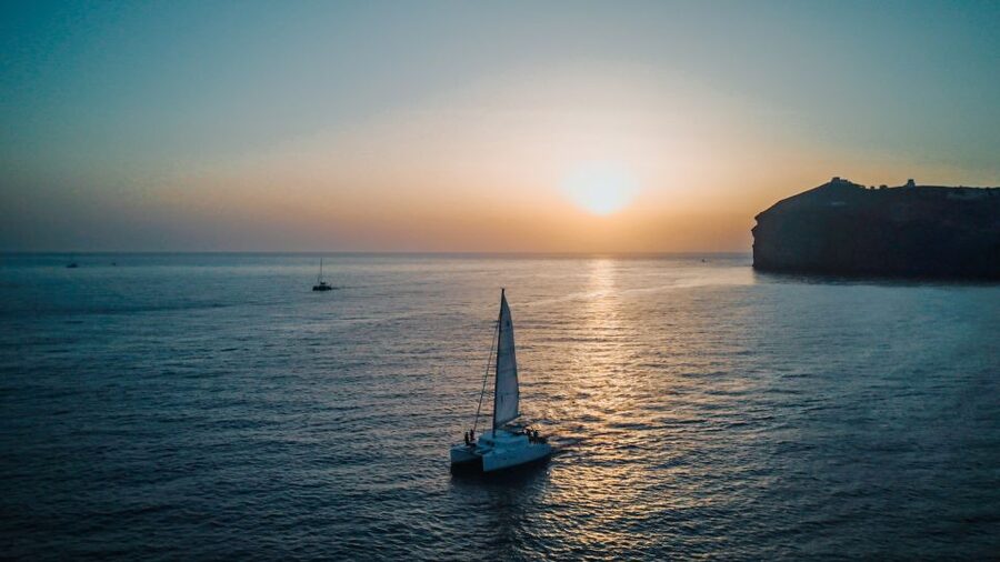 Santorini Catamaran Cruise with Swimming, Meal and Open Bar - Thirassia, lunch, and the longest stop