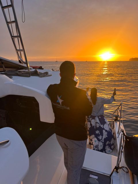 Santorini Catamaran Cruise with Swimming, Meal and Open Bar - The minibus pickup from Thera or Oia