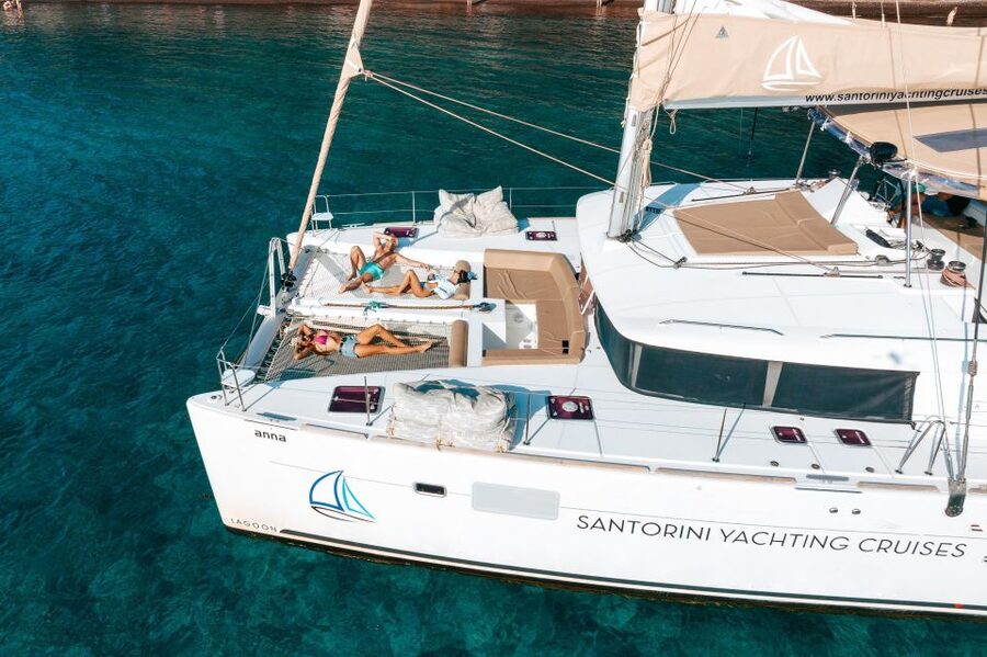 Santorini Catamaran Day Cruise: Lunch, Drinks and Transfers - Red Beach brings the first swim