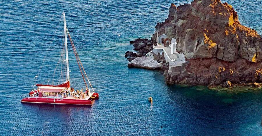 Santorini: Cruise Catamaran with BBQ & Drinks Day or Sunset - Why seeing Santorini from a catamaran works