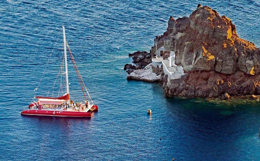 Santorini: Cruise Catamaran with BBQ & Drinks Day or Sunset - Pickup near Thera and the ride to the port