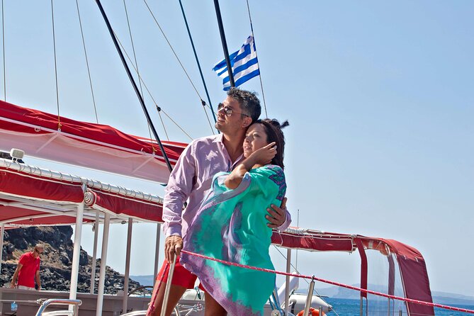 Santorini Cruise on Catamaran with BBQ & Open Bar - What the crew and onboard setup add