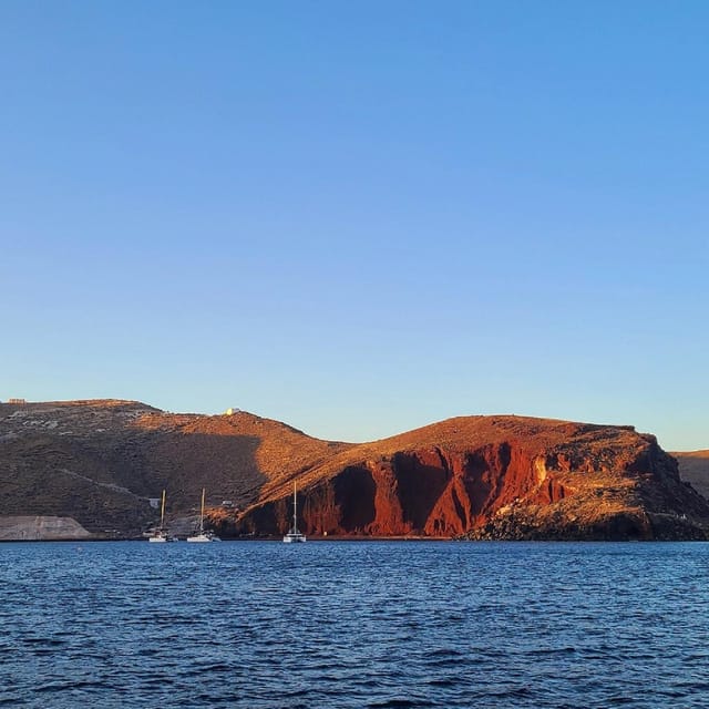 Santorini:Cruises with Catamaran around the Volcanic Island. - Why seeing Santorini from a catamaran makes sense