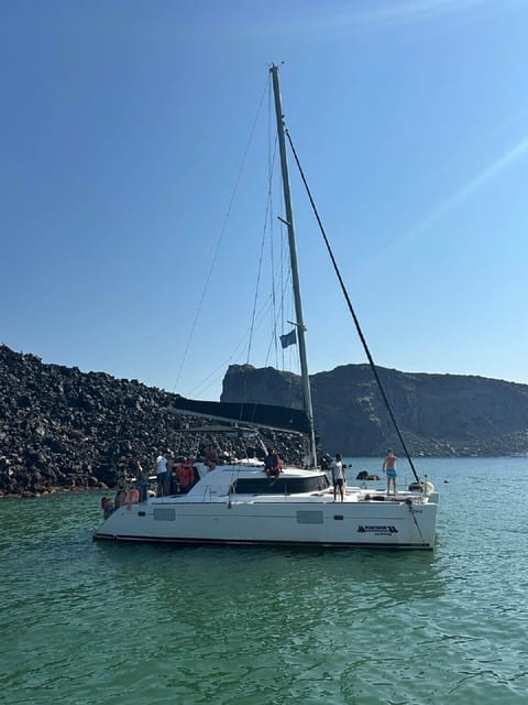 Santorini:Cruises with Catamaran around the Volcanic Island. - Mesa Pigadia swimming time and lunch from the barbecue