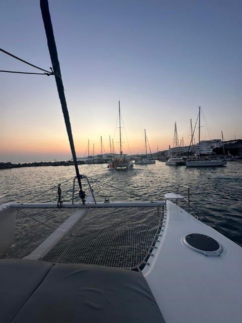 Santorini:Cruises with Catamaran around the Volcanic Island. - Daylight sailing or a sunset finish