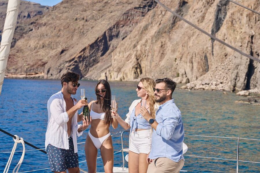 Santorini: Day Luxury Catamaran Cruise with Meal & Drinks - Black lava and the volcanic islets