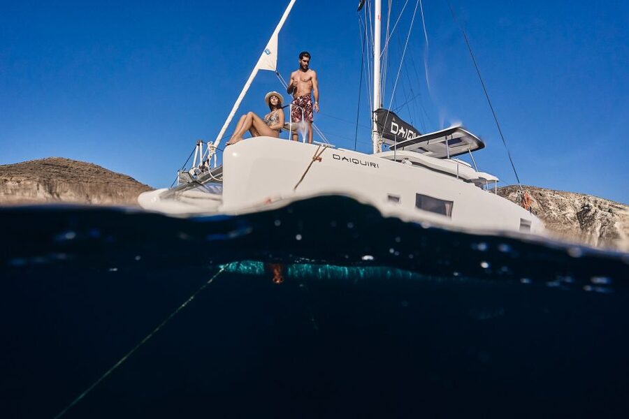 Santorini: Day Luxury Catamaran Cruise with Meal & Drinks - A Greek BBQ served on the catamaran