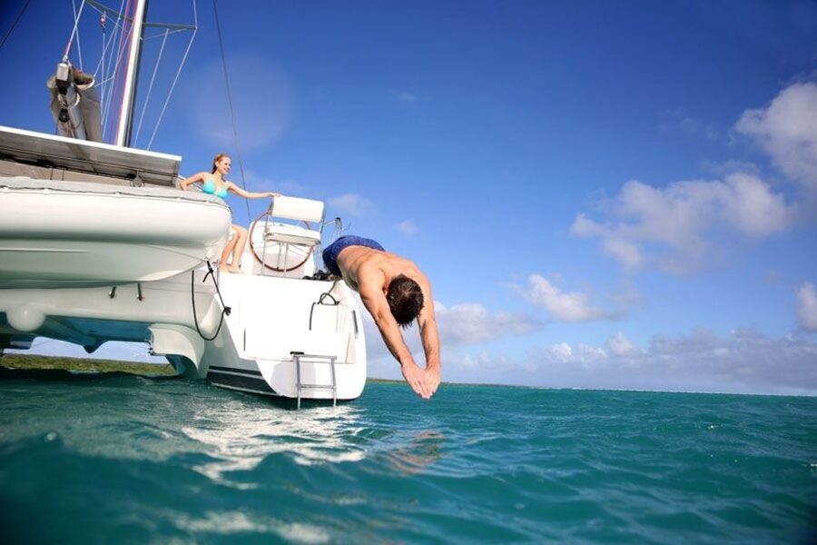 Santorini: Dream Catcher 5-hour Sailing Trip in the Caldera - Private bays, swimming, and snorkeling