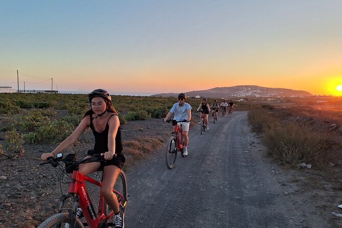 Santorini e-bike sunset tour experience - Basket-shaped vineyards and Santorini’s dry soil