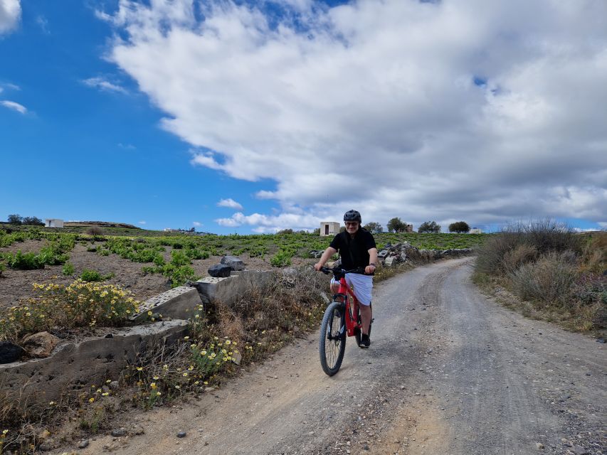 Santorini: E-Bike Sunset Tour Experience - Booking, weather, and practical planning