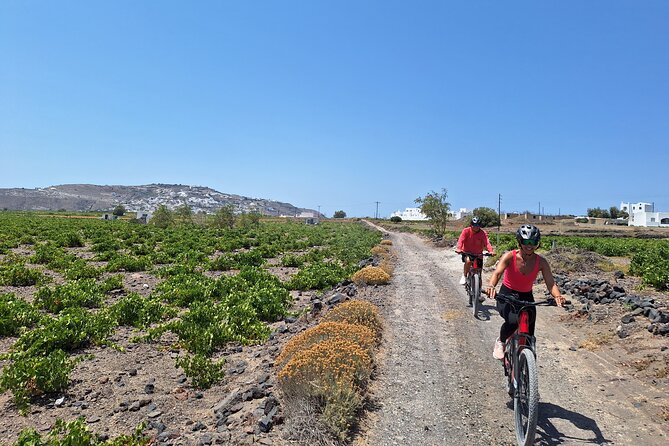 Santorini: E-Bike Sunset Tour Experience - Starting at the Tomato Industrial Museum