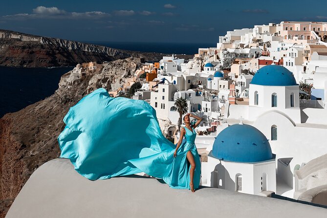 Santorini flying dress photo - Imerovigli for a quieter-looking setting