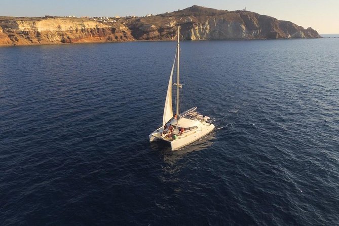 Santorini Full Day Catamaran Private Cruise incl. Meal, Drinks & Free Transport - The Old Port, Nea Kameni, and Palea Kameni